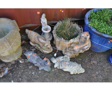 A COLLECTION OF FIVE CONCRETE GARDEN ORNAMENTS, including a planter with a beaver seated on a tree stump, two oriental style 