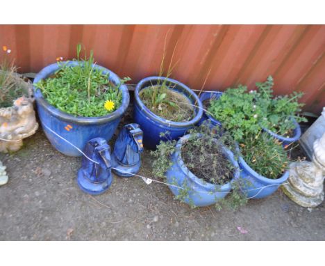 A COLLECTION OF BLUE GLAZED GARDEN POTS AND ORNAMENTS, including six plant pots, the largest being 47cm in diameter, and a pa
