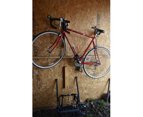 A CARRERA VIRTUOSO MEN ROAD BIKE, with a 23   frame and Shimano RSX gears, along with a rear car mounted bike rack (2)