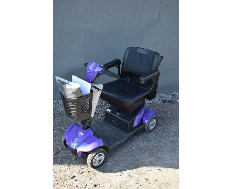 A CARECO, I-GO VERTEX SPORT MOBILITY SCOOTER, in purple, with a charger, two keys, manual and two covers, condition report: P