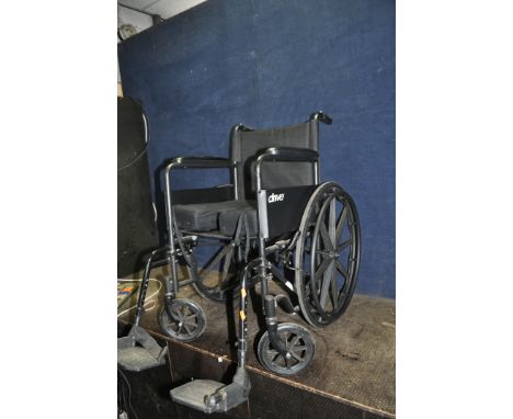 A DRIVE MOBILITY FOLDING WHEELCHAIR, with cushion and two footrests