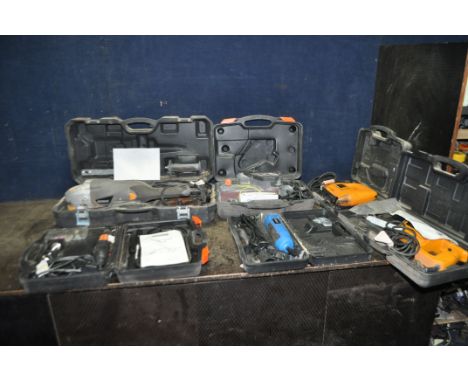 A COLLECTION OF SIX CASED POWER TOOLS, comprising a JCB D-RS1 reciprocating saw, a D-JS jigsaw, a Titan 9in angle grinder, Ch
