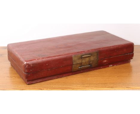 A Chinese red lacquered&nbsp;papier mȃch&eacute;&nbsp;scroll box or trunk - 19th century, with brass lock plate and hinges. (