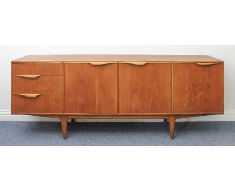 Tom Robertson for McIntosh of Kirkcaldy, Scotland: a retro teak Dunvegan sideboard - with a pair of central cupboard doors en