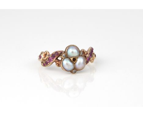 A 19th century yellow gold, ruby, pearl and diamond ring - unmarked, tests as 18ct gold, the trefoil shaped setting with thre