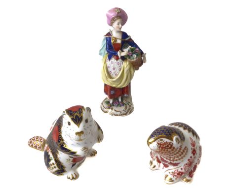 Two Royal Crown Derby beaver paperweights - one marked 'Old Imari Beaver', 10.2&nbsp; cm high; together with a German porcela