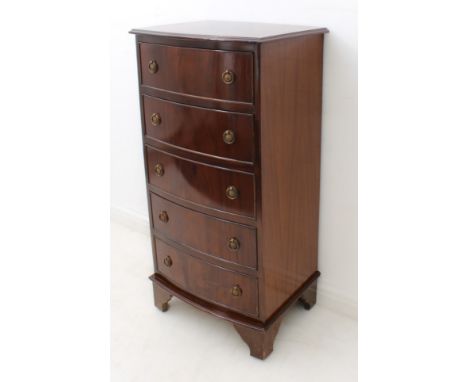 A Georgian-style bowfront mahogany chest - second half 20th century, the cross-banded, moulded top over five long drawers wit