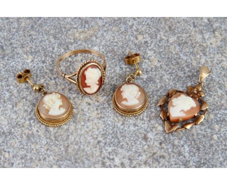 A 9ct gold and shell cameo ring - not marked, tests as 9ct gold, size Q; together with a 9ct gold and shell cameo pendant; an