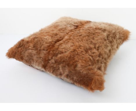 A custom made Welsh Organic Tannery goatskin cushion, the back with reindeer head fabric (49 x 49 cm)  Condition - good.