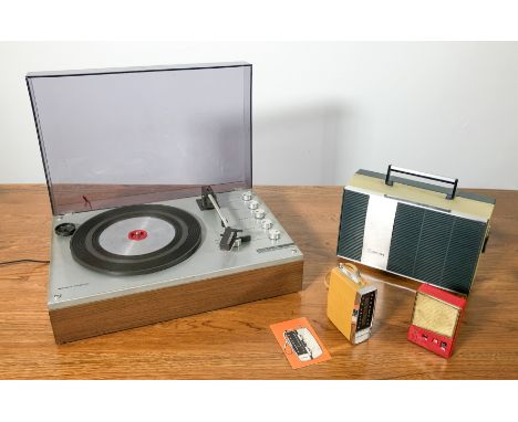 A vintage 1960s Philips portable 'suitcase' style record player - 3 speed for 33, 45 and 78rpm, with mono speaker inside lid 