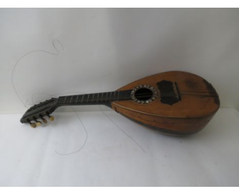 Late 19th/early 20th century mandolin with inlaid floral mother of pearl decoration, 22 1/2 long