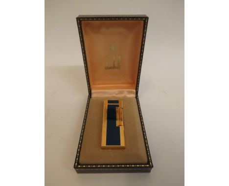 Dunhill - a 1980s gold plated and enamelled Rollagas lighter with blue marbled panels in a brown faux leather case