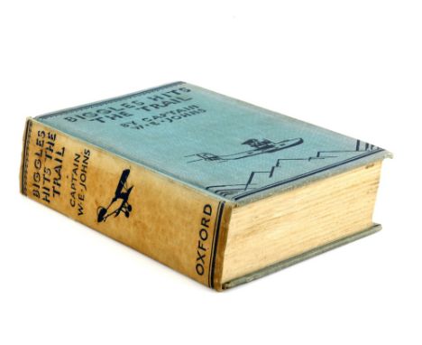 Johns, Capt. W.E. 'Biggles Hits The Trail', First Edition, Published by The Oxford University Press, 1935, in blue/beige clot