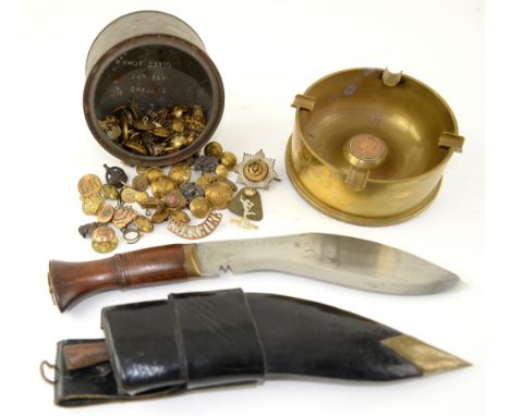 Kukri, Shell case converted to an ashtray and a box of badgesThis item is being sold on behalf of Woking and Sam Beare Hospic