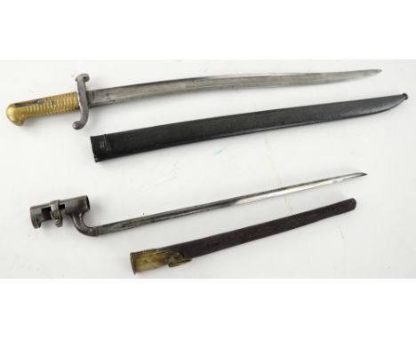 French Model 1866 Chassepot Sword Bayonet with scabbard,and a British P1853 socket bayonet with part scabbard (2).    