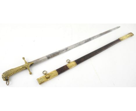 19th century sword with brass hilt with lion pommel, blade 74 cms, leather and brass scabbard.    