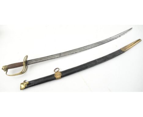 19th century sword with lion pommel and with wire handle, curved blade, 70 cms., in leather and brass scabbard.    