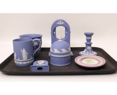 Wedgewood Jasperware including two clock cases (1 with movement) candlestick, jardinaire lidded pot, mug and pink jasper fram