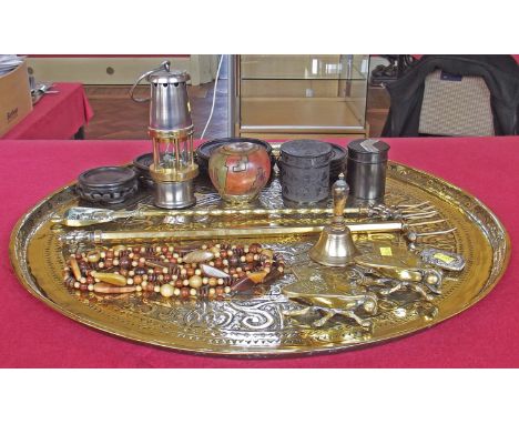 Large brass tray, small wolf safety lamp, brass bell, pr brass ashtrays in the form of insects, plated vesta case and 2 ebony