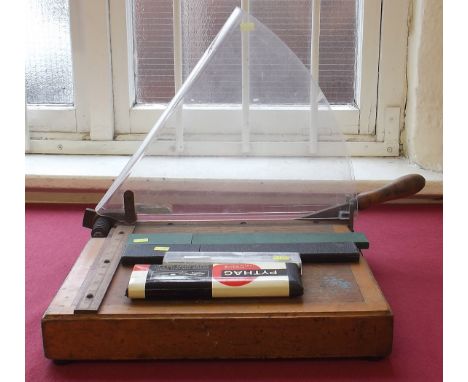 Office guillotine with guard, P.I.C engine divided slide rule, Armstrong (A.W. Faber) scale ruler, pair of cased apollo divid