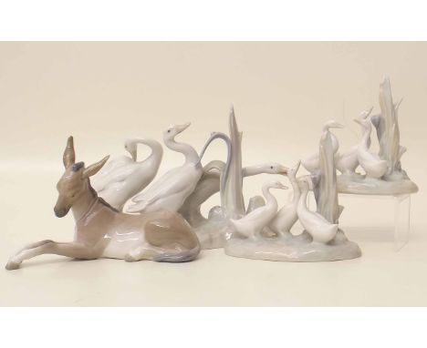 Lladro geese group, donkey and two Nao geese groups. Condition report: see terms and conditions