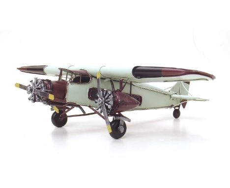 Ford tri-engine tin plate aeroplane Condition report: see terms and conditions