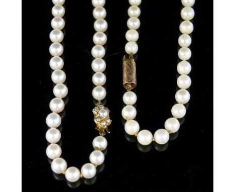Cultured pearl necklace, approximately 6.5mm, on a 9ct gold clasp, length 72cm; another pearl necklace, 6.5mm, on a 14k clasp