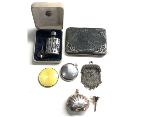 Selection of silver items includes scent bottles small enamel mirror etc 
