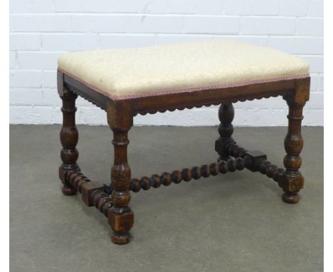 Oak stool, rectangular upholstered top on bobbin legs with stretcher, 60 x 43 x 41cm.
