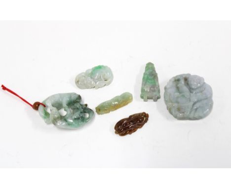 A group of six carved jade pendants to include horses, fish and a seated man, 5.5cm (6)