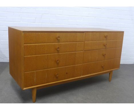 Vintage light oak chest, likely Meredew, with two banks of four graduating drawers, 131 x 68 x 46cm.
