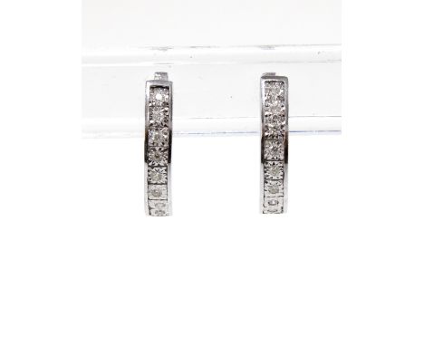 A pair of 18ct white gold diamond set hoop earrings, stamped 750