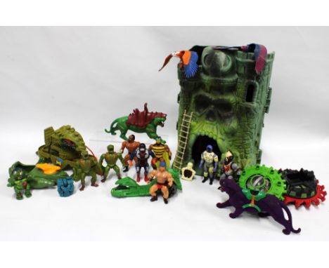 Vintage He-Man Masters of the Universe toys, including Castle Grayskull and various action figures, and some other associated