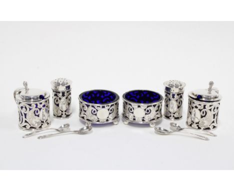 Edwardian six piece silver cruet set by Deakin &amp; Francis, Birmingham 1907, comprising a pair of drum mustard pots, open s