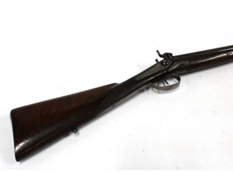 An antique percussion double sporting goose gun.&nbsp; Lock named Pratt, Edinburgh and inscribed with game birds.&nbsp; (Sold
