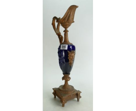 A large old gilt metal and ceramic ewer: ( spout restored)