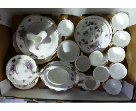 A large collection of Hammersley Victorian Violets patterned items to include: part tea set, dinner plates, bowls etc 