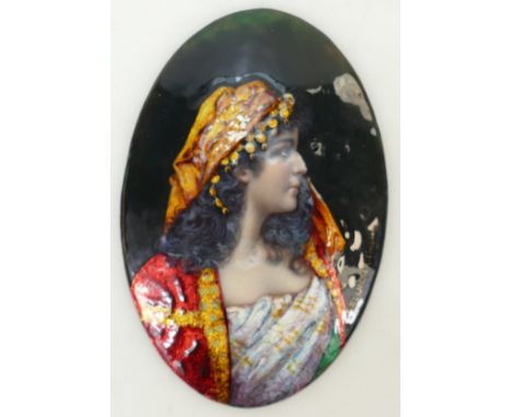 A Limoges revival Enamel portrait Plaque: Limoges revival portrait oval plaque enamelled on copper with a profile portrait of