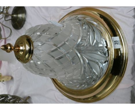 A large modern glass and brass effect ceiling light: