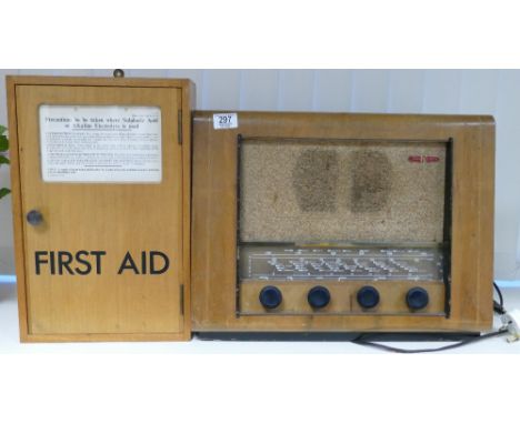 A mixed collection of items to include: Pye Valve Radio, Wooden boxed first Aid Box, Brass &amp; Bakelite light switches, tel