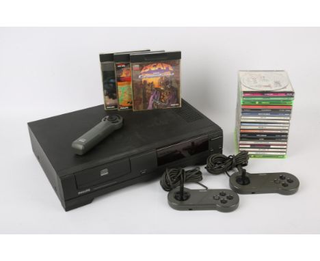 Philips CDI 210 Console. This lot contains a fully tested Philips CDI 210 console, two control pads, one remote control and o