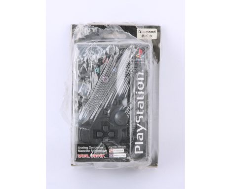 PS1 Diamond Black Dual Shock controller-PlayStation Japanese Exclusive - Sealed. This lot features the Japanese exclusive PS1