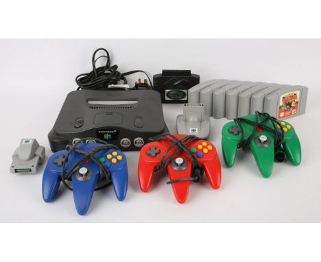 Nintendo 64 Console & 7 games. This lot contains an unboxed Nintendo 64 console, three coloured controllers (Red, Blue & Gree
