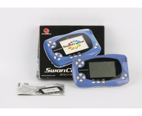 Bandai - Swancrystal Blue - Boxed. This is a Japanese handheld made by Bandai. it comes fully working and complete in the box