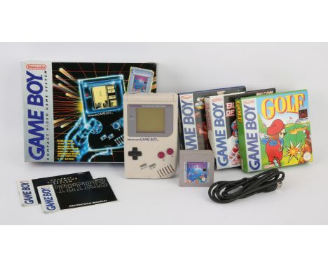 Nintendo Game Boy - Boxed & 4 Games. This lot contains the First generation grey Game Boy in its original box bundled with Te