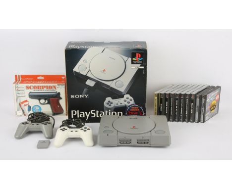 Sony PlayStation Console Collection & 10 Games.  This lot features a fully tested and boxed Sony PlayStation (Original PlaySt