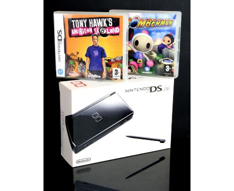 Nintendo DS Lite Black - Complete in Box & Games. This item contains a complete in box Nintendo DS lite, fully working and wi