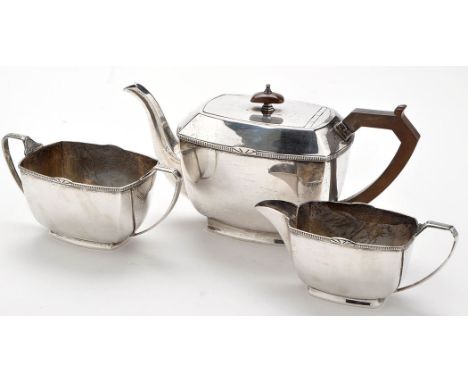 A George V three-piece silver tea service, by Stower & Wragg Ltd., Sheffield 1934, shaped rectangular with straight gadrooned