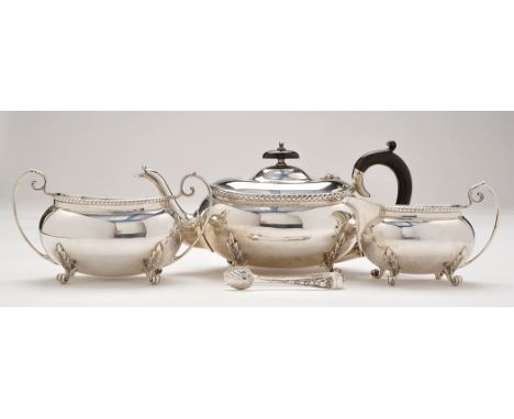 A George V three-piece tea service, by J. Gloucester, Birmingham 1934, each piece of oval form with leaf pattern border, the 