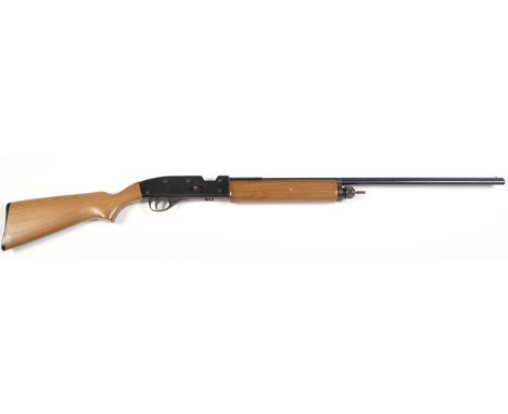 A Crosman 'Trap Master 1100' CO2 powered shotgun No. 001685 .38 cal., black metalwork and plain light wood stock, c.1968-71, 